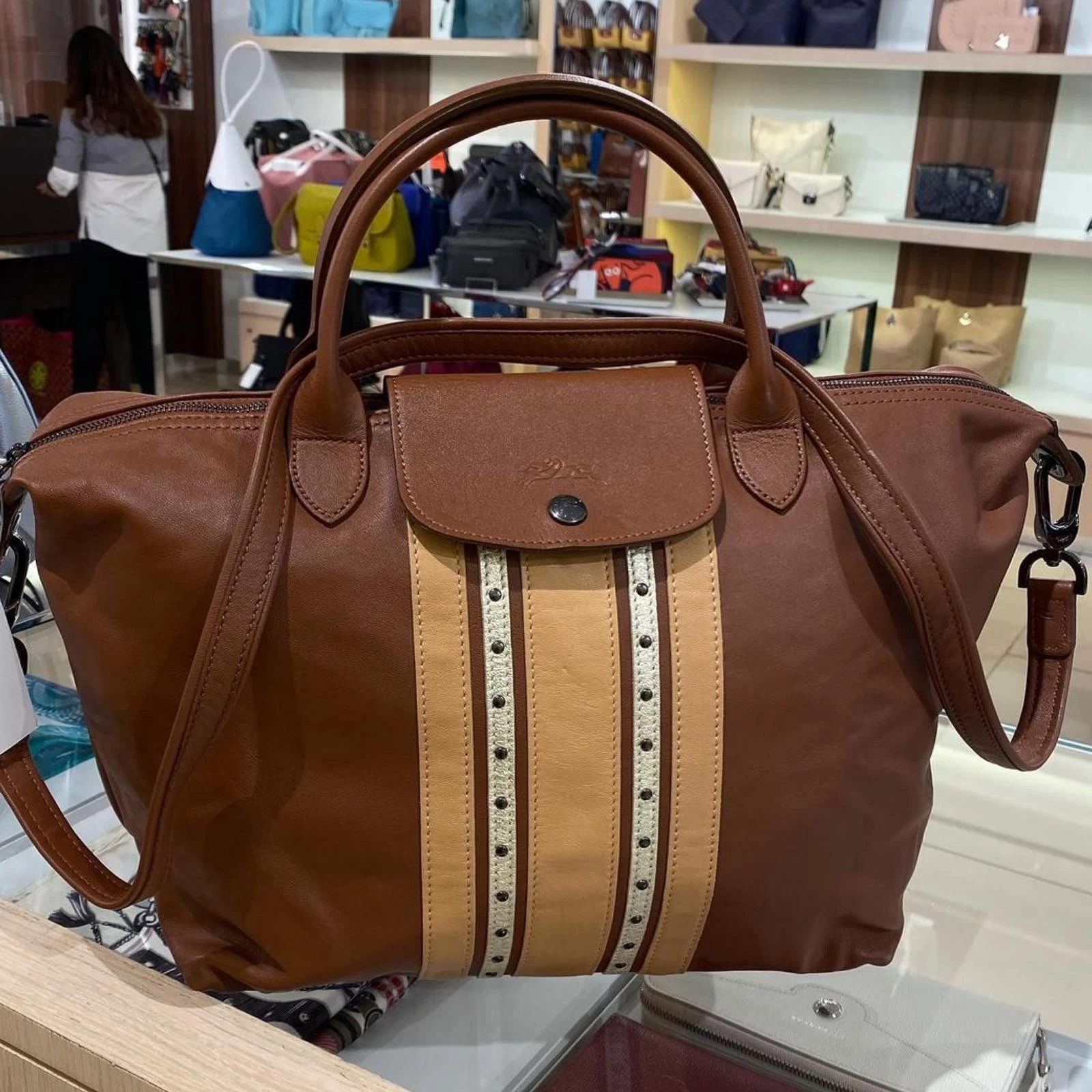 Thrift stores make no sense. A fake longchamp bag for 60 and a beautiful LL  bean leather bag for 10 : r/ThriftGrift