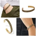 MARC JACOBS MONOGRAM ENGRAVED BRACELET - AGED GOLD - ONE SIZE